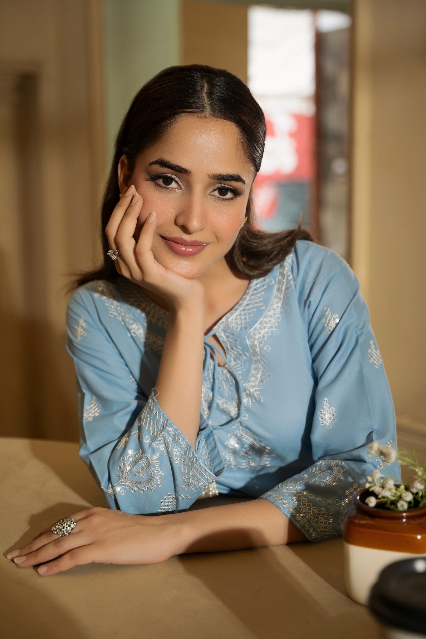 Daniya sky blue embroidered lawn suit back view - Mizaaz Pakistan